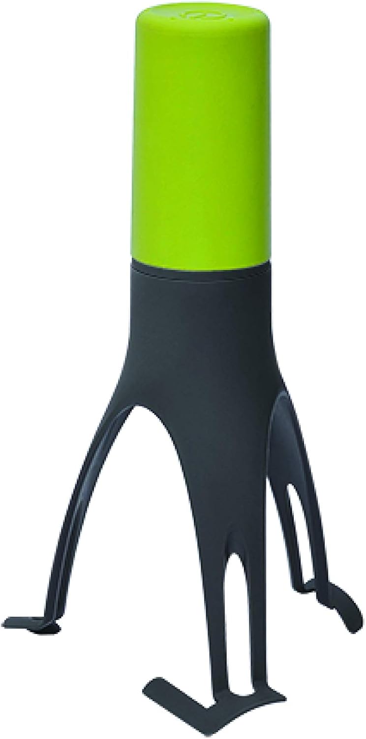 Uutensil Stirr, agitatore automatico per pentole color oliva. Fotografia ufficiale del prodotto.